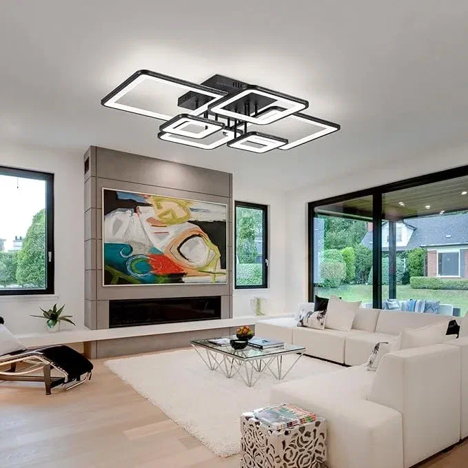 Modern multi-ring LED ceiling light by Shine LUEST illuminating a bright, minimalist home office.