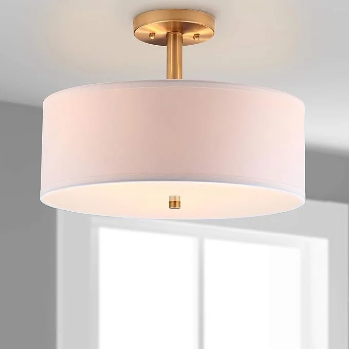 Elegant SAFAVIEH Clara semi-flush drum ceiling light providing soft ambient lighting for home office.