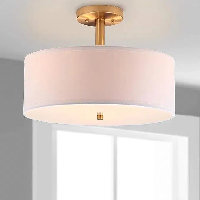 Elegant SAFAVIEH Clara semi-flush drum ceiling light providing soft ambient lighting for home office.