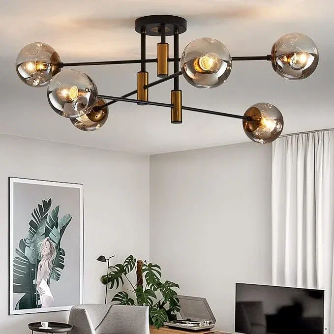 Six-light glass globe sputnik ceiling fixture blending mid-century design with bright office lighting.