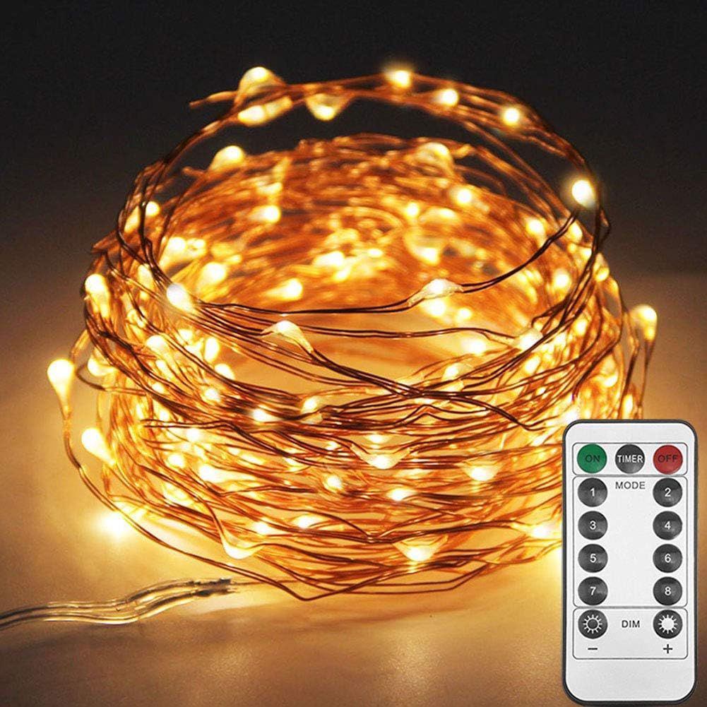 Twinkle Star warm-white copper wire fairy lights coiled up and lit, showing the fine bendable wire and small LED bulbs