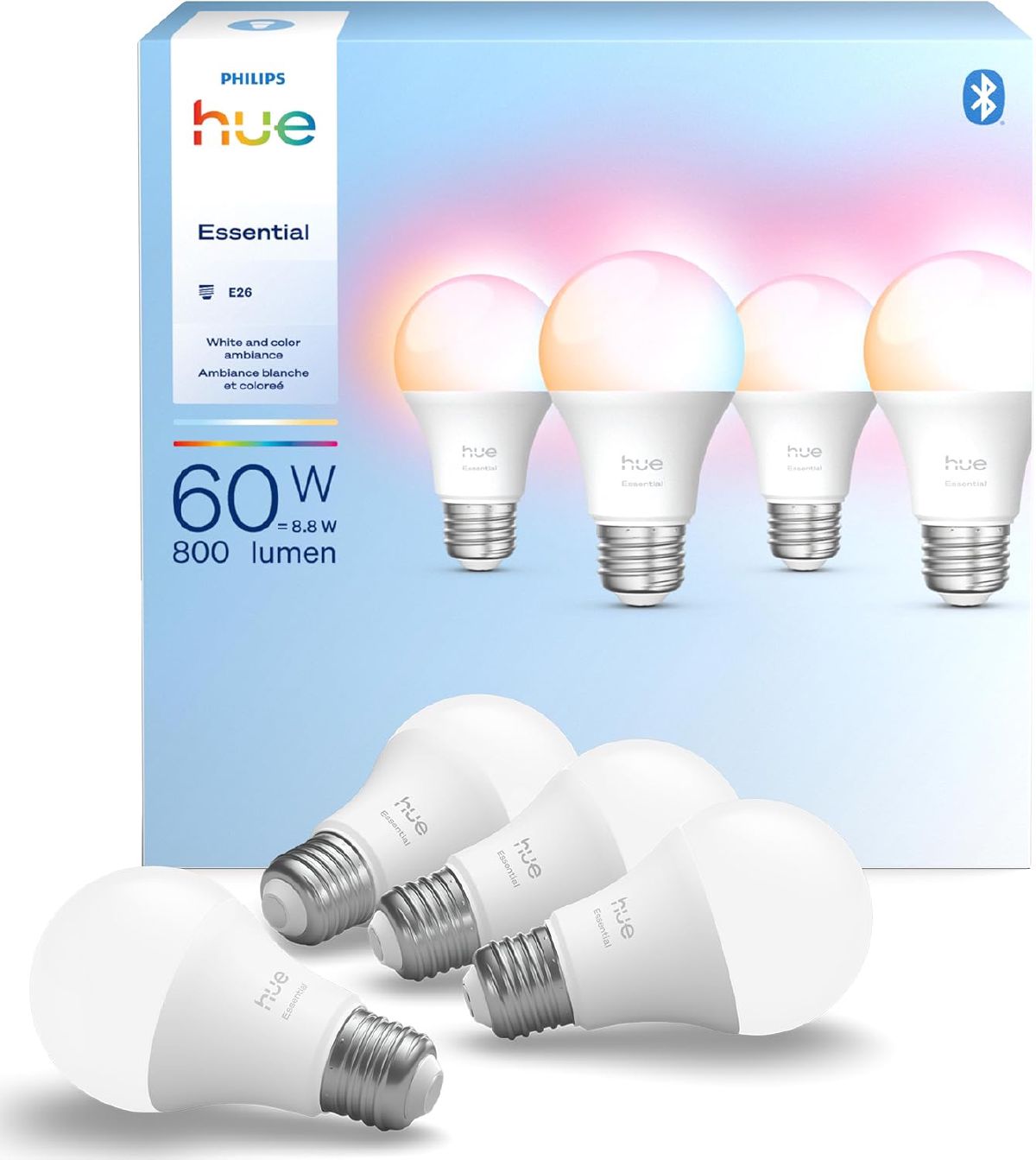 Philips Hue Essential smart LED bulb four-pack retail box next to the bulbs themselves