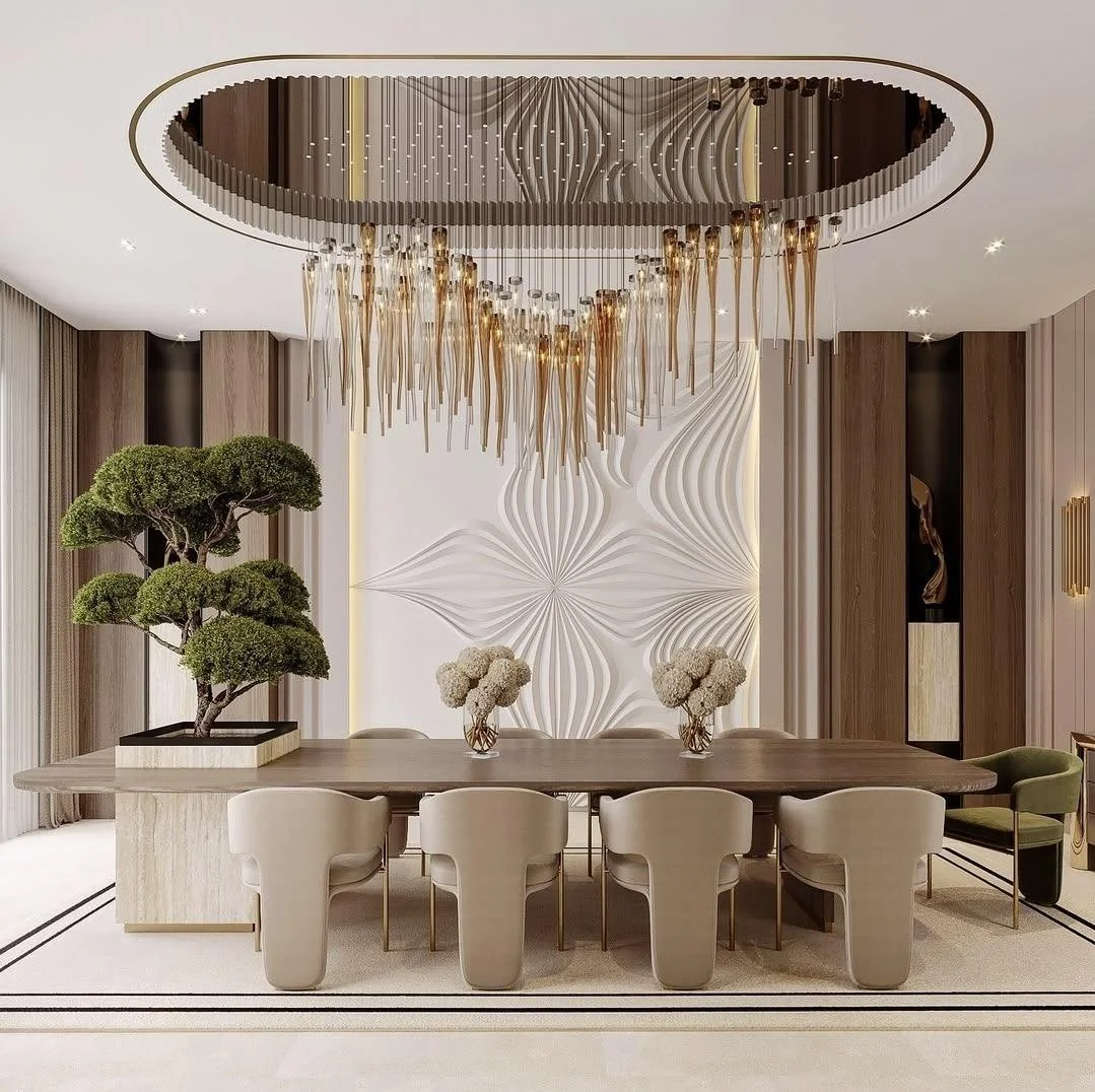 Modern dining room with a long wooden table, chairs, and a large chandelier.