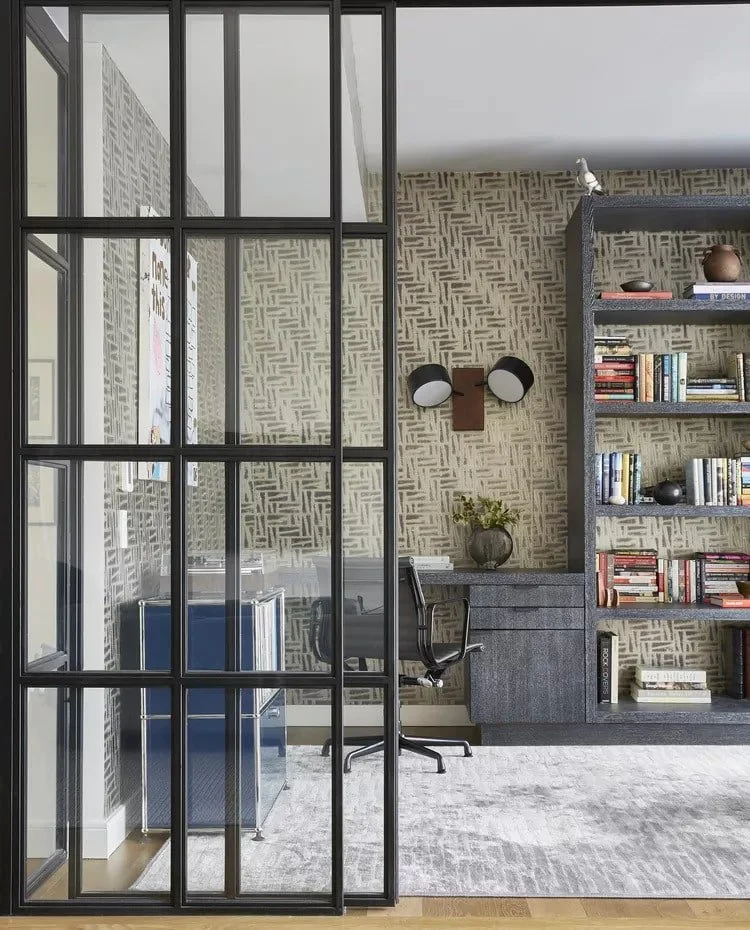 Types of office ceiling lights: This room uses wall-mounted lights instead of traditional ceiling fixtures.