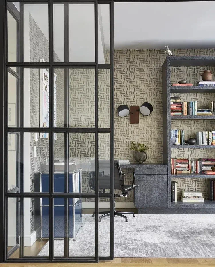 Types of office ceiling lights: This room uses wall-mounted lights instead of traditional ceiling fixtures.