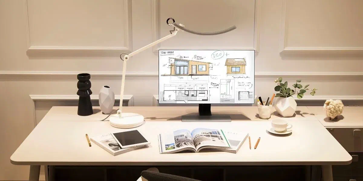 Minimalist home office with task lighting and modern desk setup