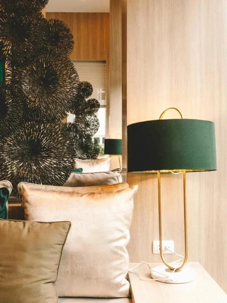 A stylish plug in light perfect for lighting a bedside