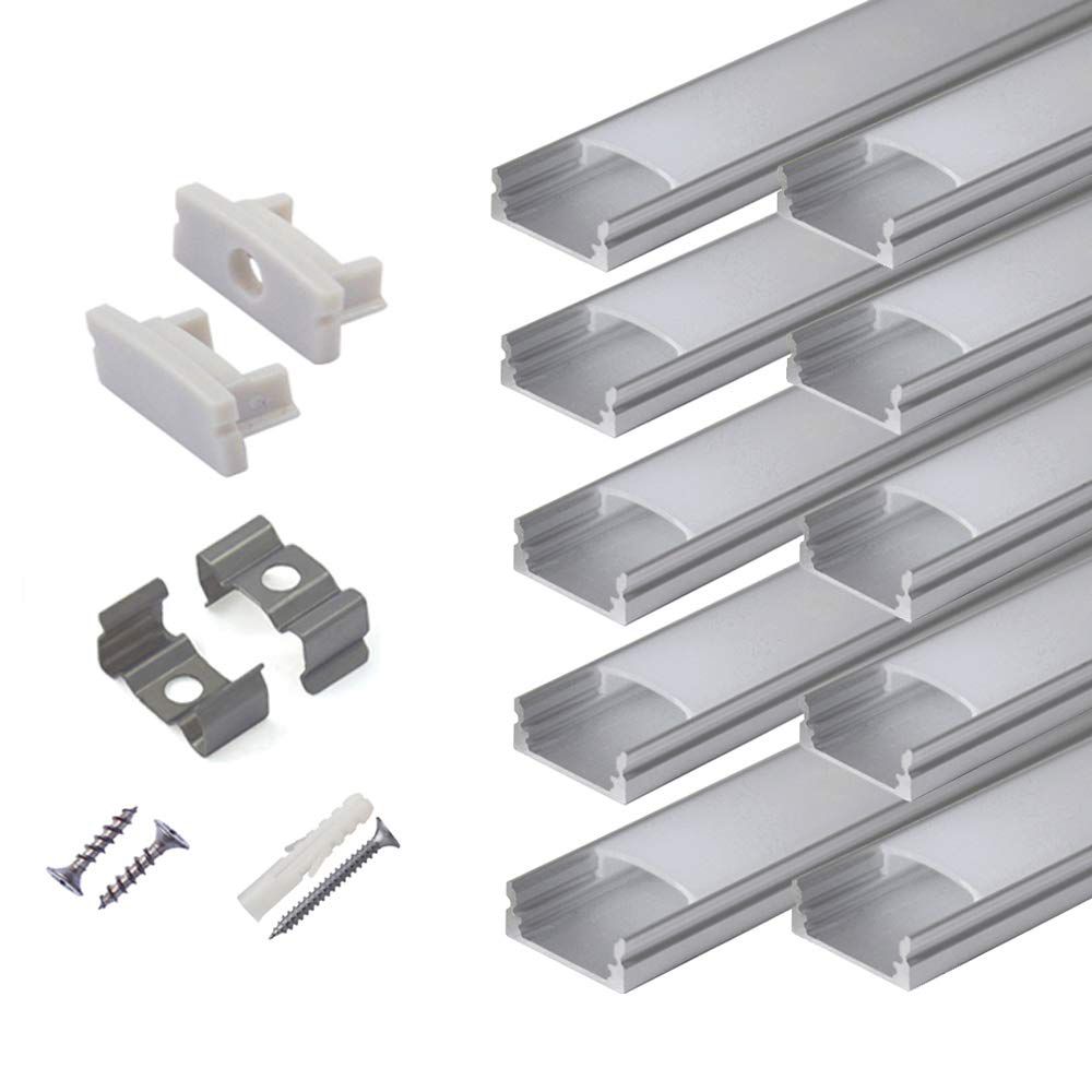 Ten aluminum U-shape LED channel profiles with milky diffuser covers, end caps, and mounting clips laid out for installation.