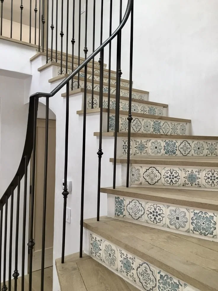 Wooden and metal staircase with decorative risers