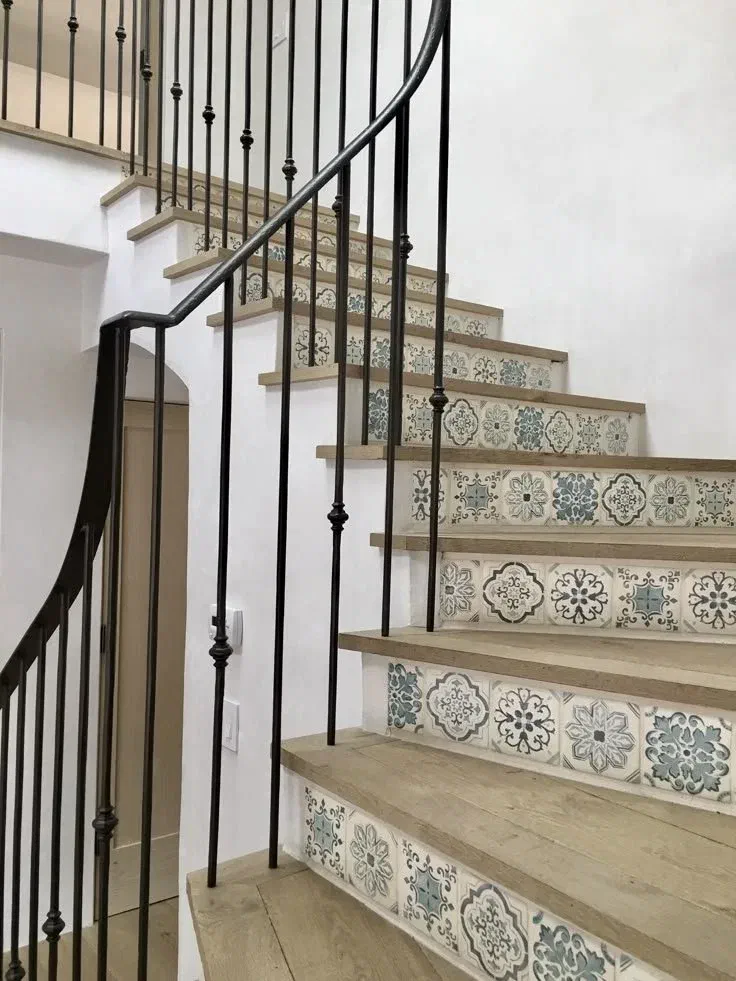 Wooden and metal staircase with decorative risers