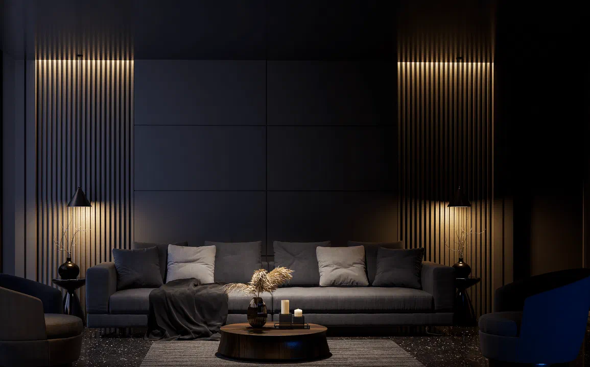 Modern living room with ambient wall lighting, dark grey sofa, and cozy decor including candles and accent lamps.